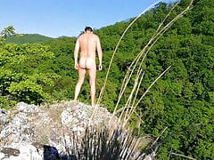 Hot masturbation in the mountains. Sexy Guy jerks in forest and huge cumshot