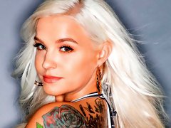 Elegant blonde with tattoos Bella Jane enjoys intensive anal sex
