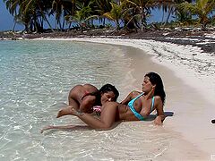 Addictive lezzie play at the beach for two sensual dolls