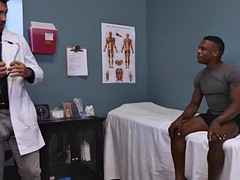 Black stud gets blowjob before being fucked bareback in the doctors office