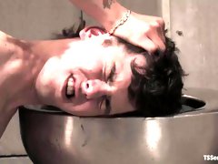 Dominant BDSM tranny anal drills a submissive gay twink