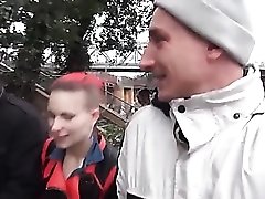 Punk slut blows them both and fucks doggystyle outdoors